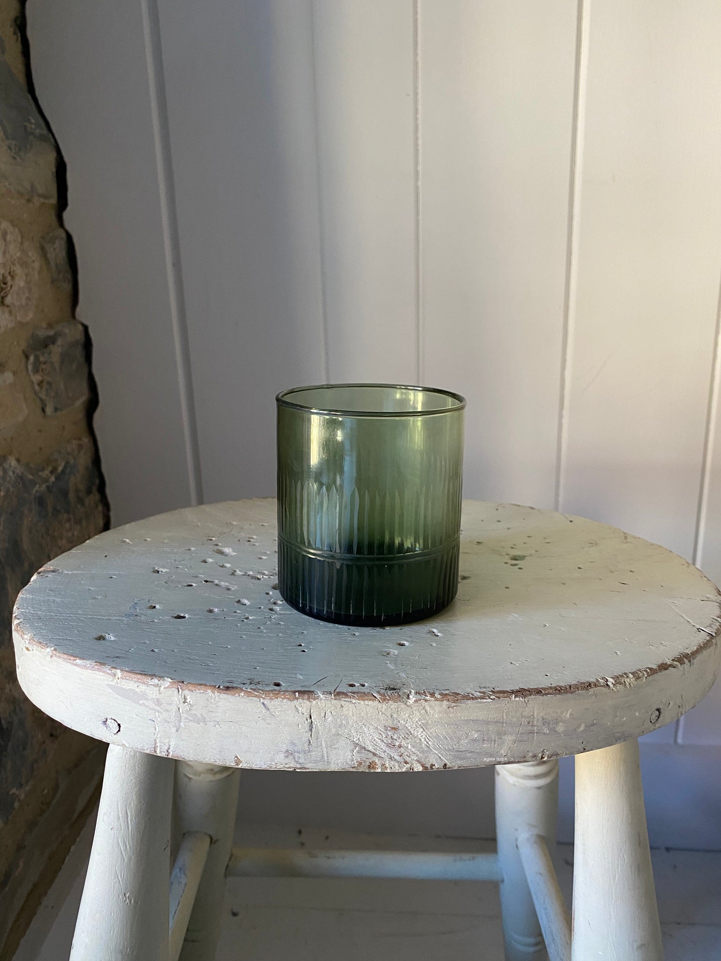 Nkuku Mila Dark Emerald Tumbler Glass with seasonal posy