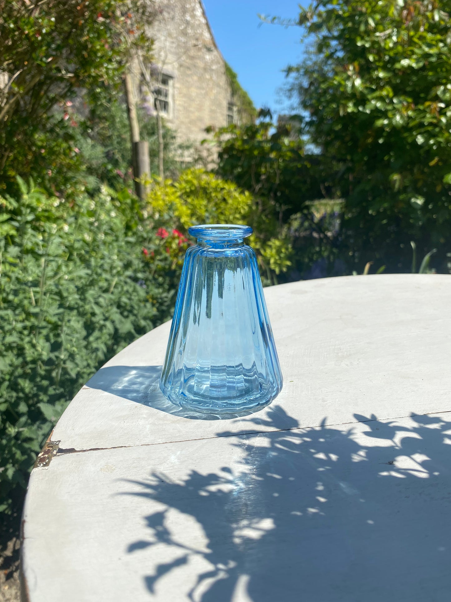 Triangle Glass Bud Vase in Ice Blue & a posy of seasonal flowers