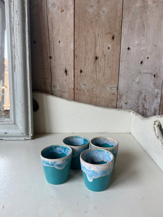 A Set of 4 Earthenware Espresso Cups