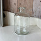 Clear Bottle Bud Vase  - Including a posy of seasonally inspired flowers