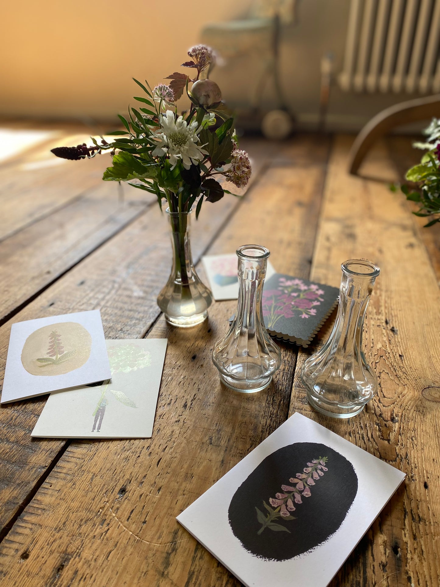 A Bedside Duo Of Pretty Bud Vases - including a seasonal posy in each vase