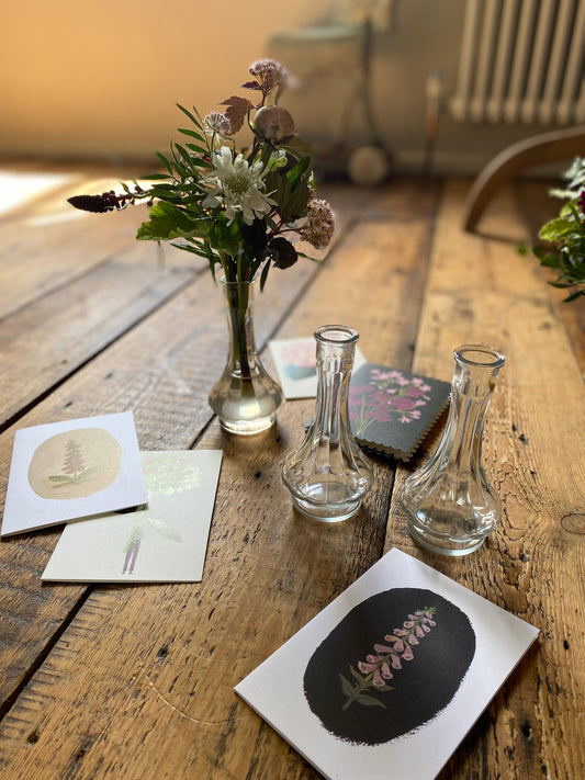 A Bedside Duo Of Pretty Bud Vases - including a seasonal posy in each vase