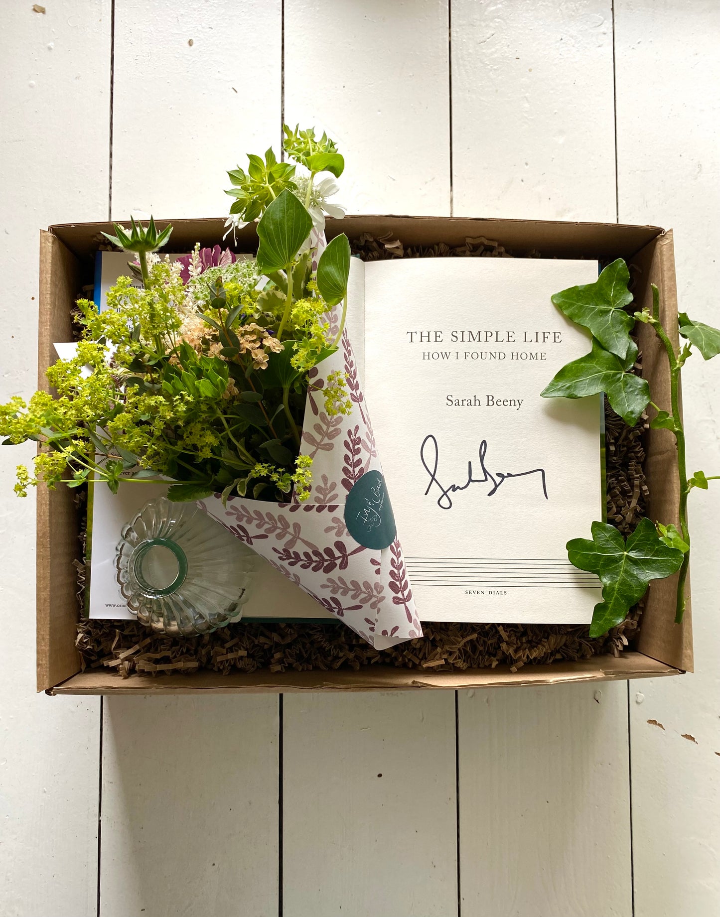 The Simple Life Gift Box - including a clear shell bud vase with a posy of seasonal flowers